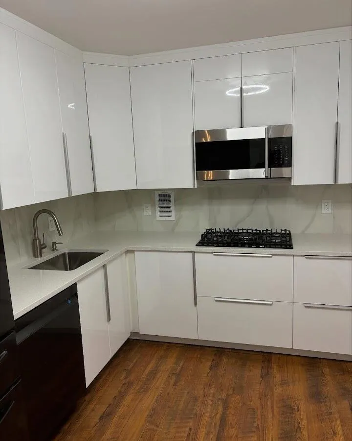 Restored kitchen with white cabinets after water damage in Vadnais Heights
